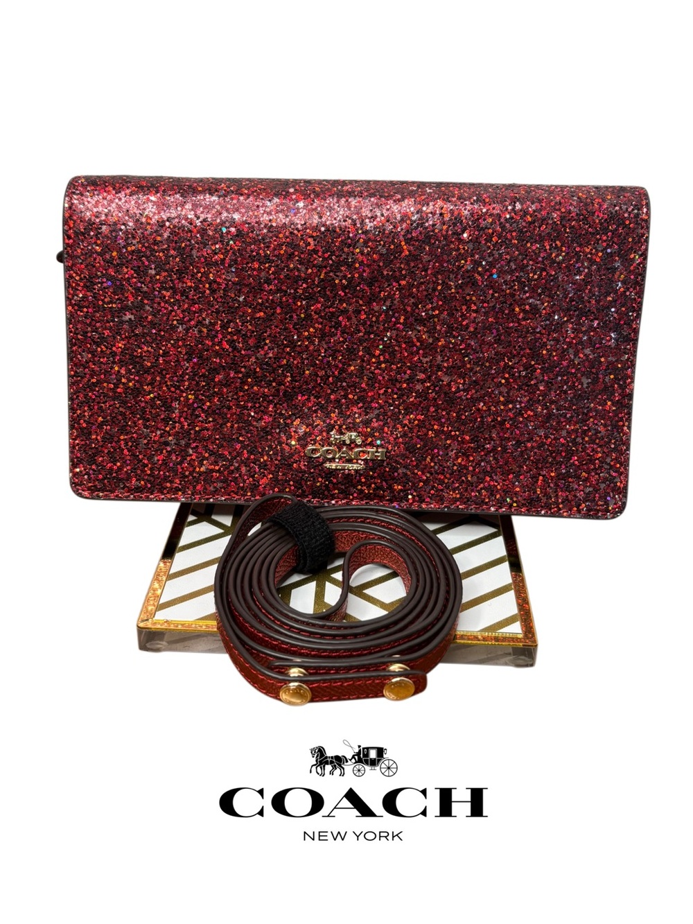 Coach Hayden Foldover Crossbody Clutch in red glitter with gold-tone hardware.